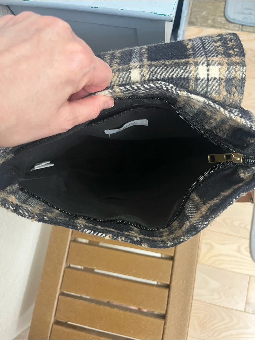 Natural Reflections black and beige plaid backpack